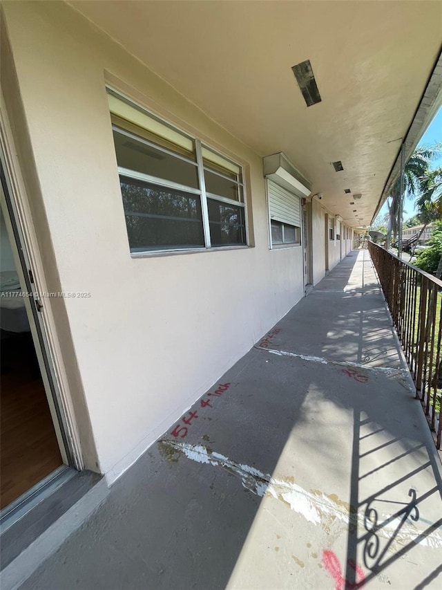230 SW 11th Ave Unit 15, Hallandale Beach, FL 33009 - view of patio featuring a balcony