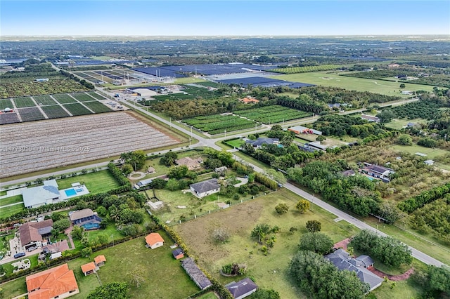 birds eye view of property featuring a rural view