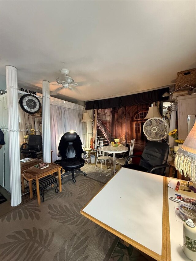 15610 NE 6th Ave Unit 32C, Miami, FL 33162 - carpeted living room with stairway and ceiling fan