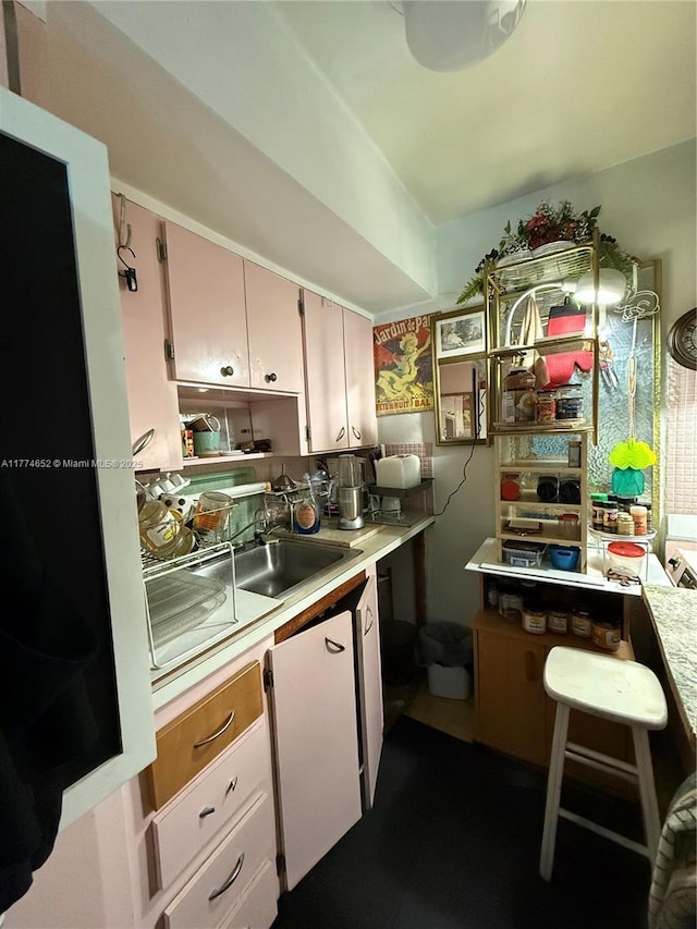 15610 NE 6th Ave Unit 32C, Miami, FL 33162 - kitchen featuring a sink and light countertops
