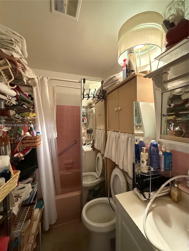 15610 NE 6th Ave Unit 32C, Miami, FL 33162 - bathroom featuring visible vents, toilet, vanity, and shower / bath combination with curtain