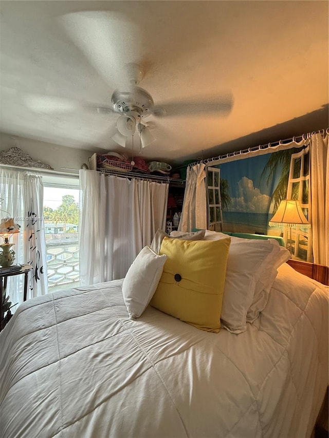 15610 NE 6th Ave Unit 32C, Miami, FL 33162 - bedroom featuring access to exterior and ceiling fan