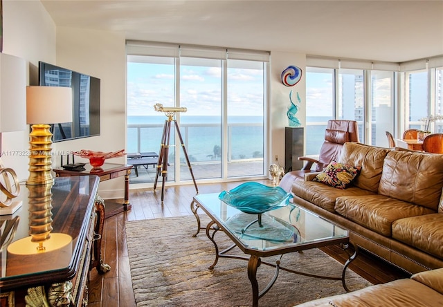 1850 S Ocean Dr Unit 1004, Hallandale Beach, FL 33009 - living room with hardwood / wood-style flooring and expansive windows