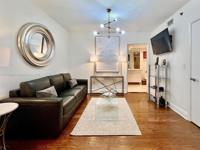 1850 S Ocean Dr Unit 1004, Hallandale Beach, FL 33009 - living area featuring baseboards, visible vents, and dark wood finished floors