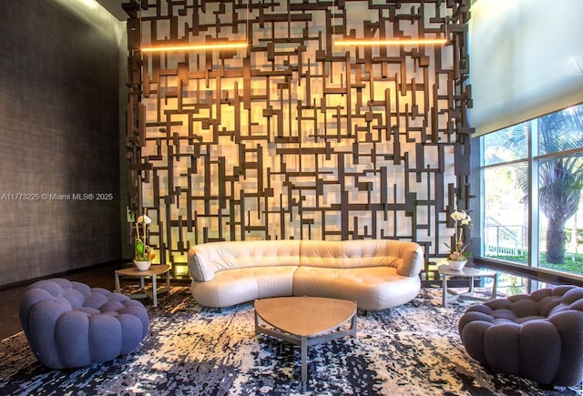 1850 S Ocean Dr Unit 1004, Hallandale Beach, FL 33009 - sitting room featuring a wall of windows and a towering ceiling
