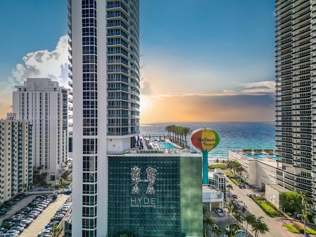 property's view of city with a water view