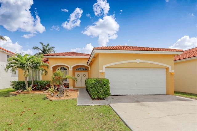 mediterranean / spanish house featuring stucco siding, a front yard, a tile roof, an attached garage, and concrete driveway