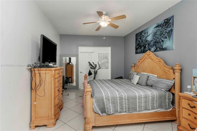 bedroom featuring light tile patterned floors and ceiling fan