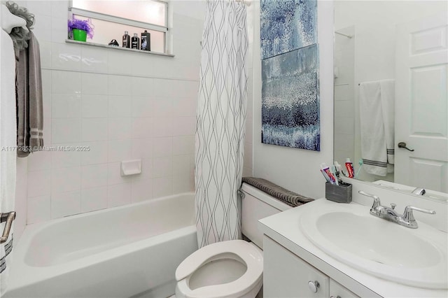 bathroom featuring toilet, vanity, and shower / bath combination with curtain
