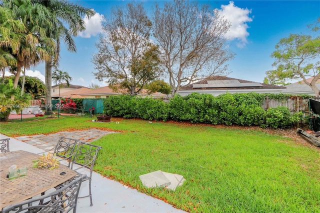 view of yard with a fenced backyard and a patio