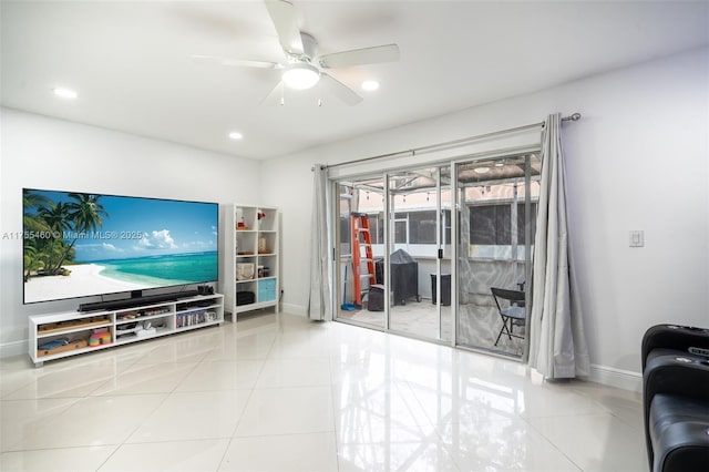 living room with recessed lighting, tile patterned flooring, baseboards, and ceiling fan