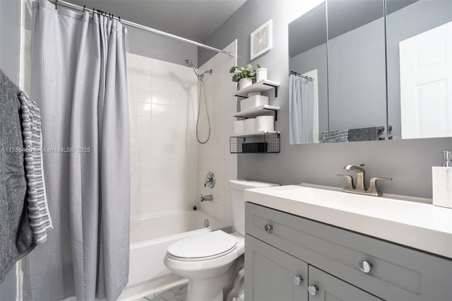 full bathroom with shower / tub combo with curtain, vanity, visible vents, and toilet