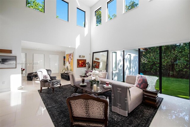 7360 SW 53rd Pl, Miami, FL 33143 - living area featuring a towering ceiling and tile patterned flooring