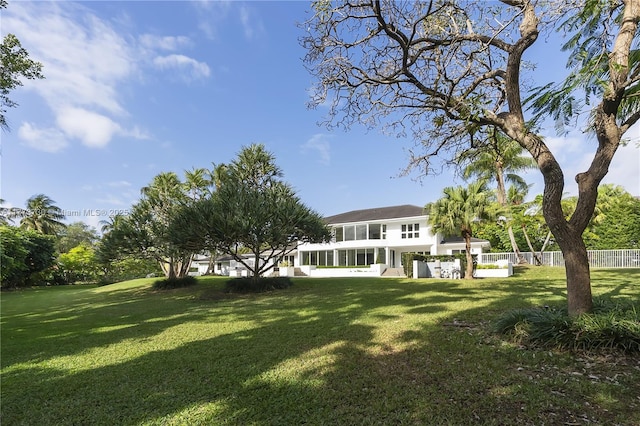 413 Santurce Ave, Coral Gables, FL 33143 - view of yard with a sunroom and fence