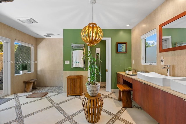 bathroom featuring visible vents and vanity