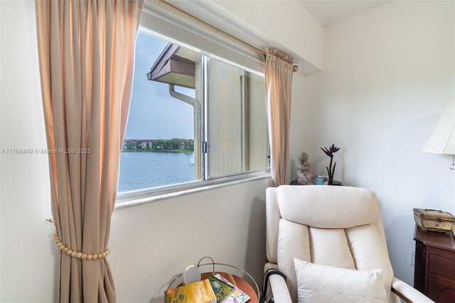 901 SW 141st Ave Unit 409M, Pembroke Pines, FL 33027 - sitting room featuring plenty of natural light and a water view