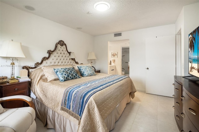 901 SW 141st Ave Unit 409M, Pembroke Pines, FL 33027 - bedroom featuring a textured ceiling