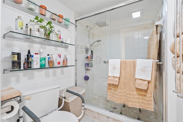 901 SW 141st Ave Unit 409M, Pembroke Pines, FL 33027 - full bath with a stall shower and toilet