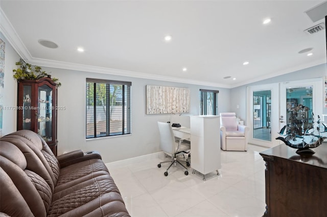 office space featuring plenty of natural light, visible vents, and crown molding
