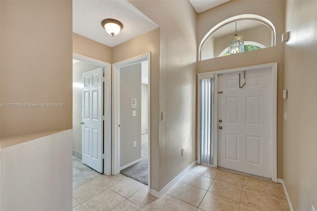 16249 NW 24th St, Pembroke Pines, FL 33028 - entryway with light tile patterned floors and baseboards