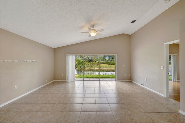 16249 NW 24th St, Pembroke Pines, FL 33028 - unfurnished room featuring lofted ceiling, ceiling fan, light tile patterned floors, and a textured ceiling