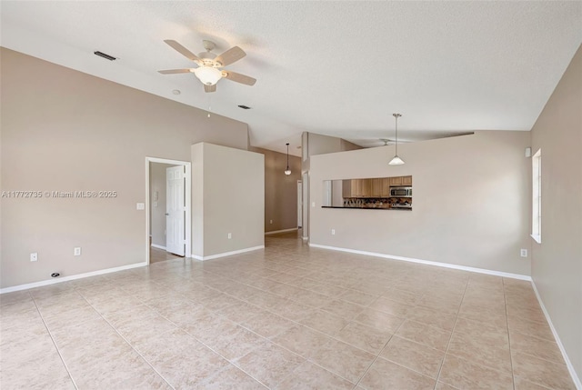 16249 NW 24th St, Pembroke Pines, FL 33028 - unfurnished living room featuring lofted ceiling, a ceiling fan, light tile patterned floors, and a textured ceiling