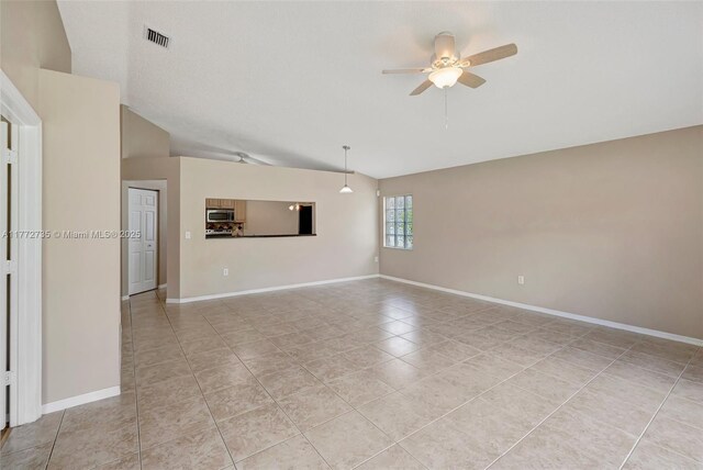 16249 NW 24th St, Pembroke Pines, FL 33028 - empty room featuring lofted ceiling, light tile patterned flooring, and ceiling fan