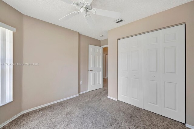 16249 NW 24th St, Pembroke Pines, FL 33028 - unfurnished bedroom with carpet floors, a closet, a textured ceiling, and ceiling fan