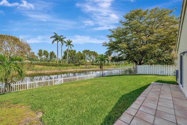 16249 NW 24th St, Pembroke Pines, FL 33028 - fenced backyard with a water view and a patio area
