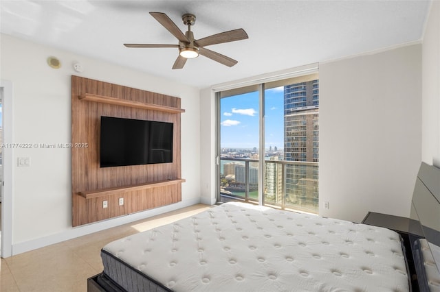 bedroom with tile patterned floors, floor to ceiling windows, a ceiling fan, access to outside, and baseboards