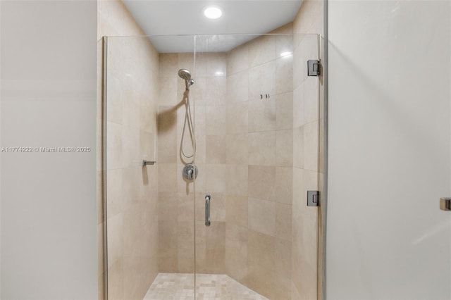 full bathroom featuring a stall shower
