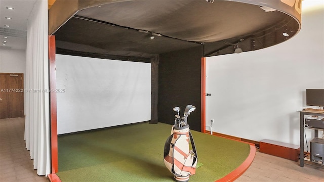 game room featuring golf simulator