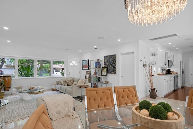 1523 Blue Rd, Coral Gables, FL 33146 - living area featuring a chandelier, baseboards, and recessed lighting
