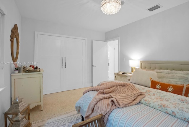 1523 Blue Rd, Coral Gables, FL 33146 - carpeted bedroom featuring a chandelier and a closet