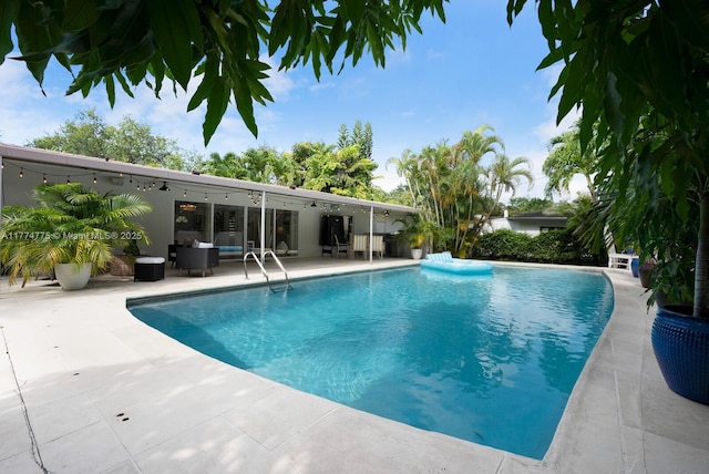1523 Blue Rd, Coral Gables, FL 33146 - outdoor pool featuring a patio area, ceiling fan, and an outdoor hangout area