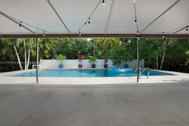 1523 Blue Rd, Coral Gables, FL 33146 - view of swimming pool with a patio area