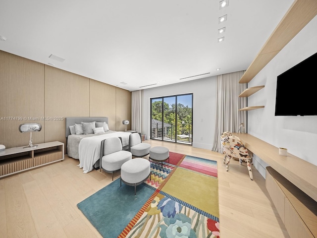 5700 SW 91st St, Pinecrest, FL 33156 - bedroom featuring light wood-style floors and access to exterior