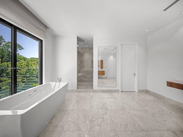 5700 SW 91st St, Pinecrest, FL 33156 - bathroom featuring recessed lighting, marble finish floor, walk in shower, and a freestanding bath