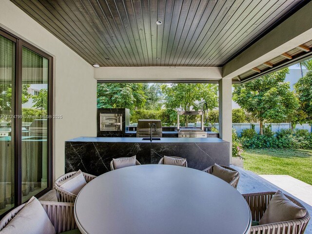 5700 SW 91st St, Pinecrest, FL 33156 - view of patio / terrace with outdoor dining area and area for grilling