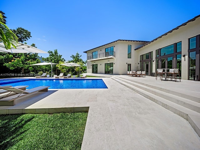 5700 SW 91st St, Pinecrest, FL 33156 - outdoor pool with a patio