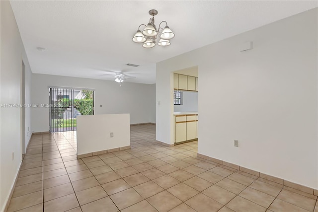1645 SW 10th St, Miami, FL 33135 - spare room featuring a chandelier, light tile patterned flooring, and ceiling fan