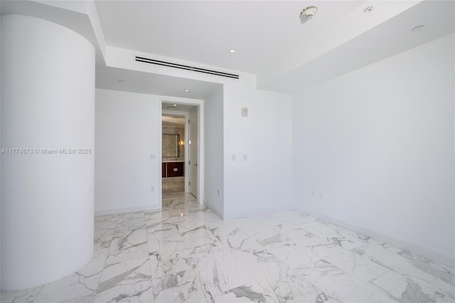15701 Collins Ave Unit 1004, Sunny Isles Beach, FL 33160 - empty room featuring marble finish flooring, recessed lighting, a smoke detector, and baseboards
