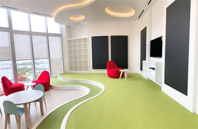 851 NE 1st Ave Unit 3905, Miami, FL 33132 - recreation room featuring carpet floors and a wall of windows