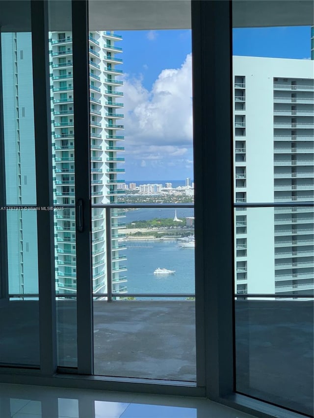 851 NE 1st Ave Unit 3905, Miami, FL 33132 - interior space with a city view, a water view, and a wealth of natural light