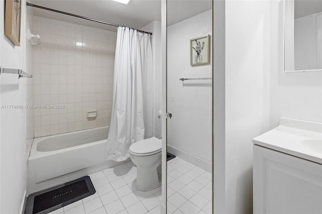 full bath featuring toilet, shower / bath combo with shower curtain, tile patterned flooring, and vanity
