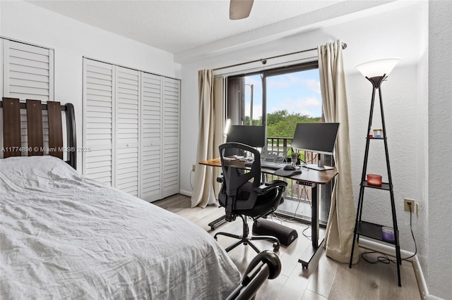 bedroom with ceiling fan, access to outside, baseboards, and wood finished floors