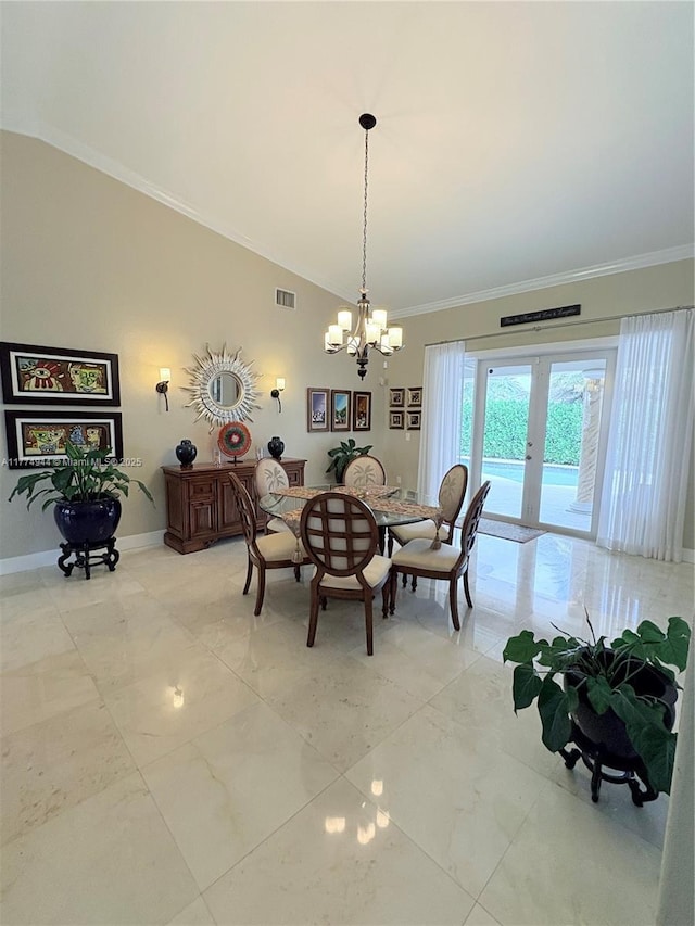 14261 SW 30th St, Miami, FL 33175 - dining area featuring ornamental molding, a chandelier, lofted ceiling, and light marble finish flooring