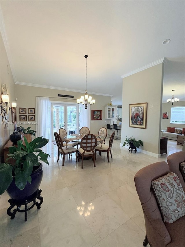 14261 SW 30th St, Miami, FL 33175 - dining space featuring a chandelier, crown molding, french doors, and light marble finish floors