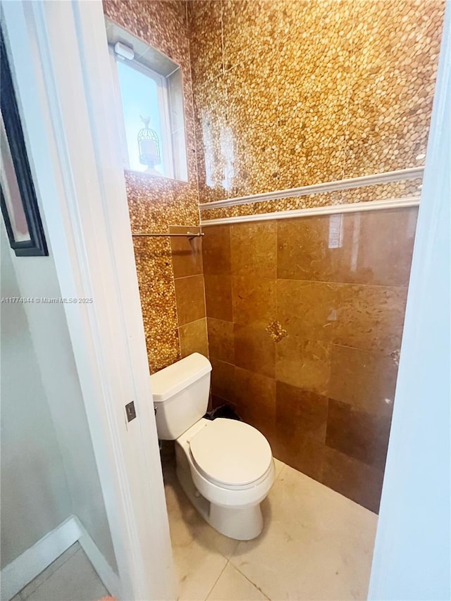 14261 SW 30th St, Miami, FL 33175 - bathroom featuring toilet and tile walls