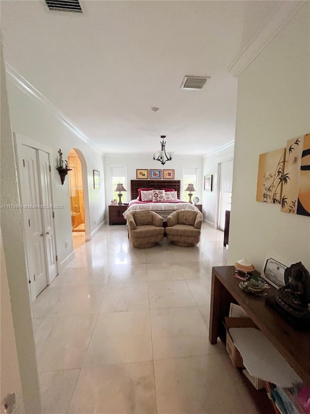 14261 SW 30th St, Miami, FL 33175 - bedroom with ornamental molding, arched walkways, and a chandelier
